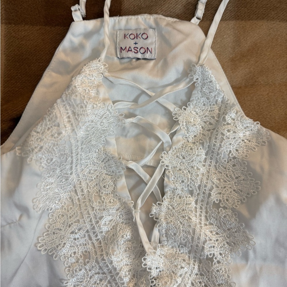 White Sleeveless Camisole with Tie Front and Embellishments